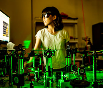 Student in MSE lab wearing goggles