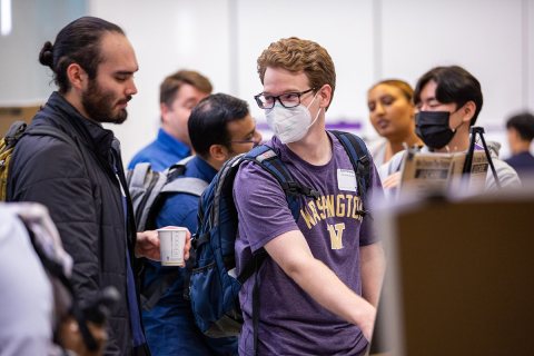 Students discuss research during the poster session of the 2022 Research & Industry Showcase